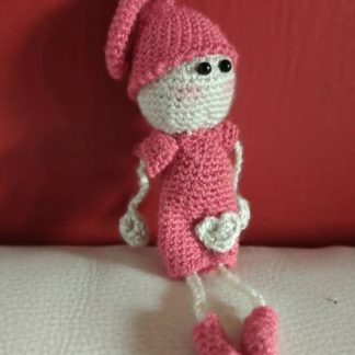 Muñeco vestido color melón