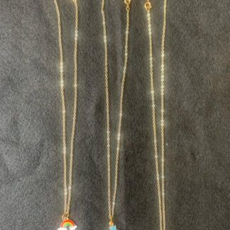 Collares baño de oro con dijes